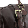 Handled And Buckle View Of The Brown Travel Bag Small
