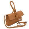 Angled And Shoulder Strap View Of The Cognac Womens Leather Clutch